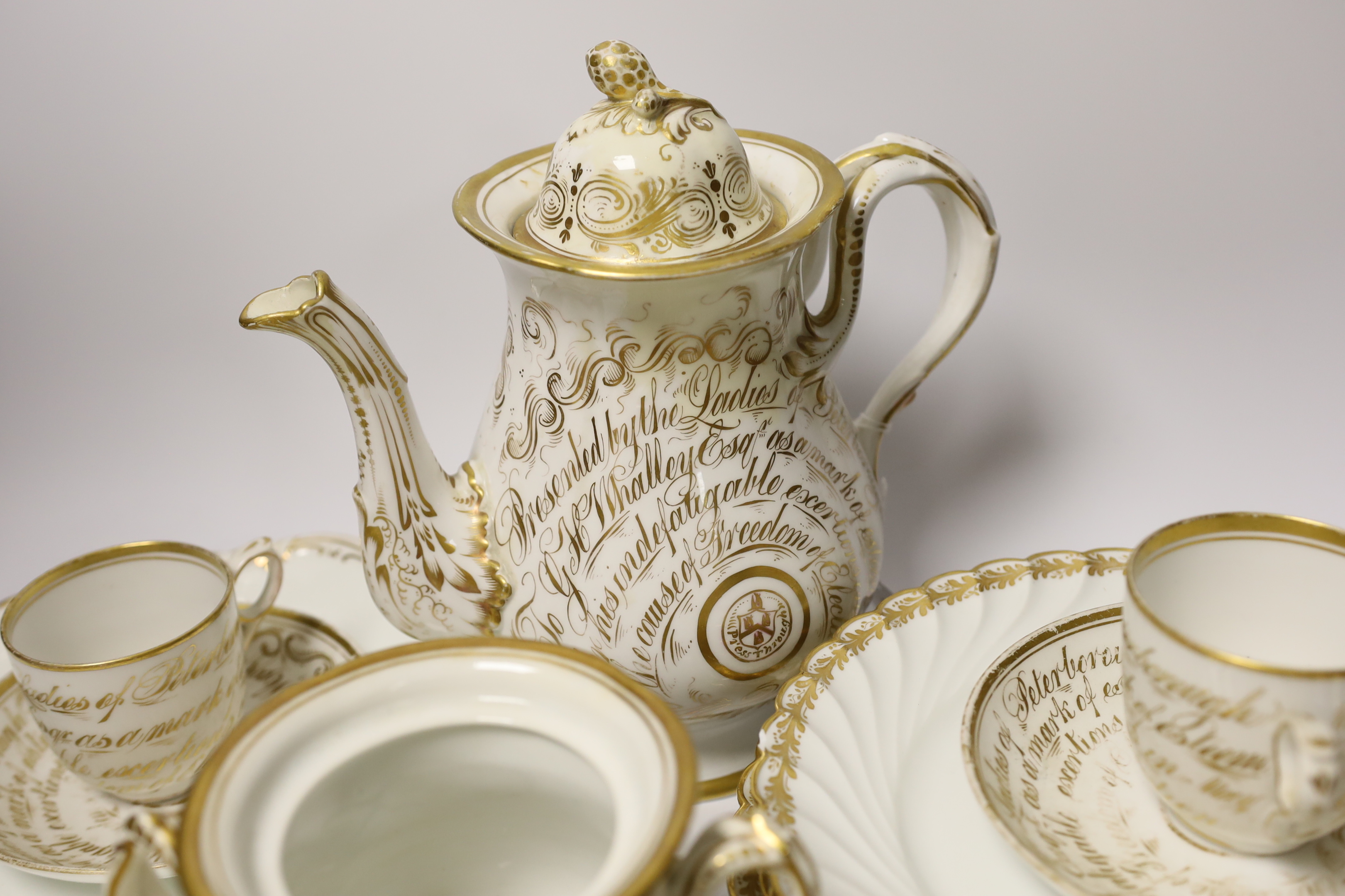 A mid-19th century English bone china part tea service, possibly Davenport, with applied gilt presentation to the Liberal politician G. H. Whalley (16 pieces), teapot 24.5cm together with Limoges plates